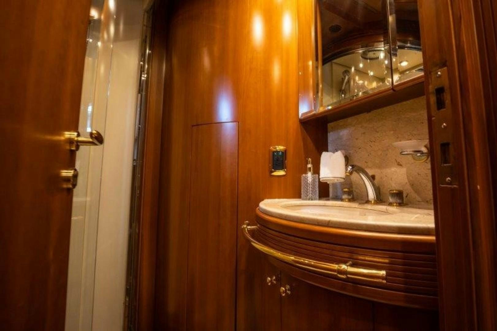 a bathroom with a sink and a mirror aboard NYHAVEN Yacht for Sale