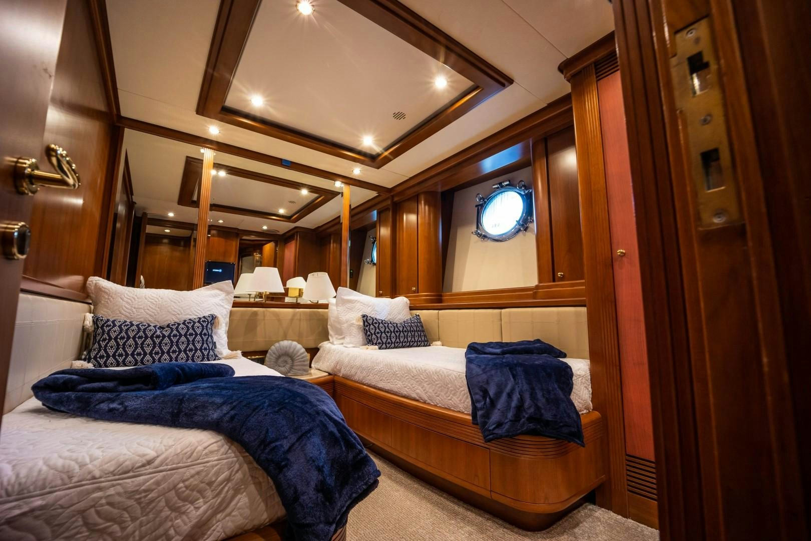 a room with two beds aboard NYHAVEN Yacht for Sale