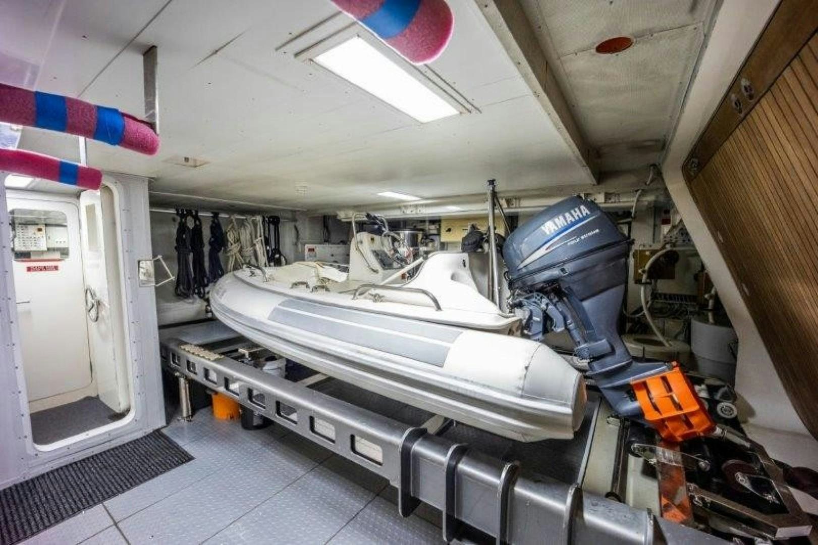 a room with a machine and a window aboard NYHAVEN Yacht for Sale