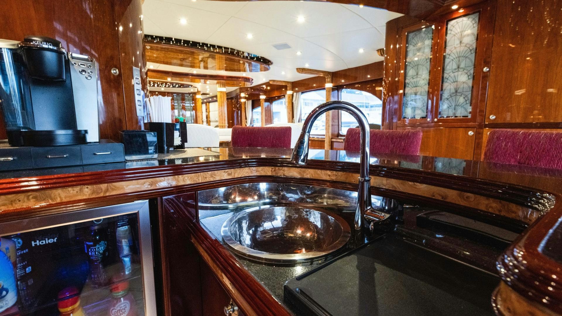 a kitchen with a sink and a large oven aboard SEA ALICE I Yacht for Sale