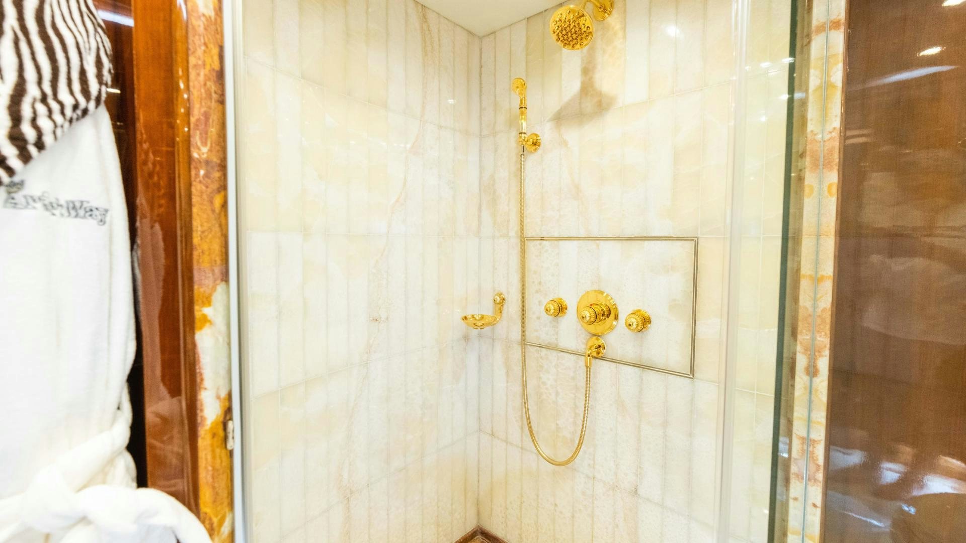 a necklace on a window aboard SEA ALICE I Yacht for Sale