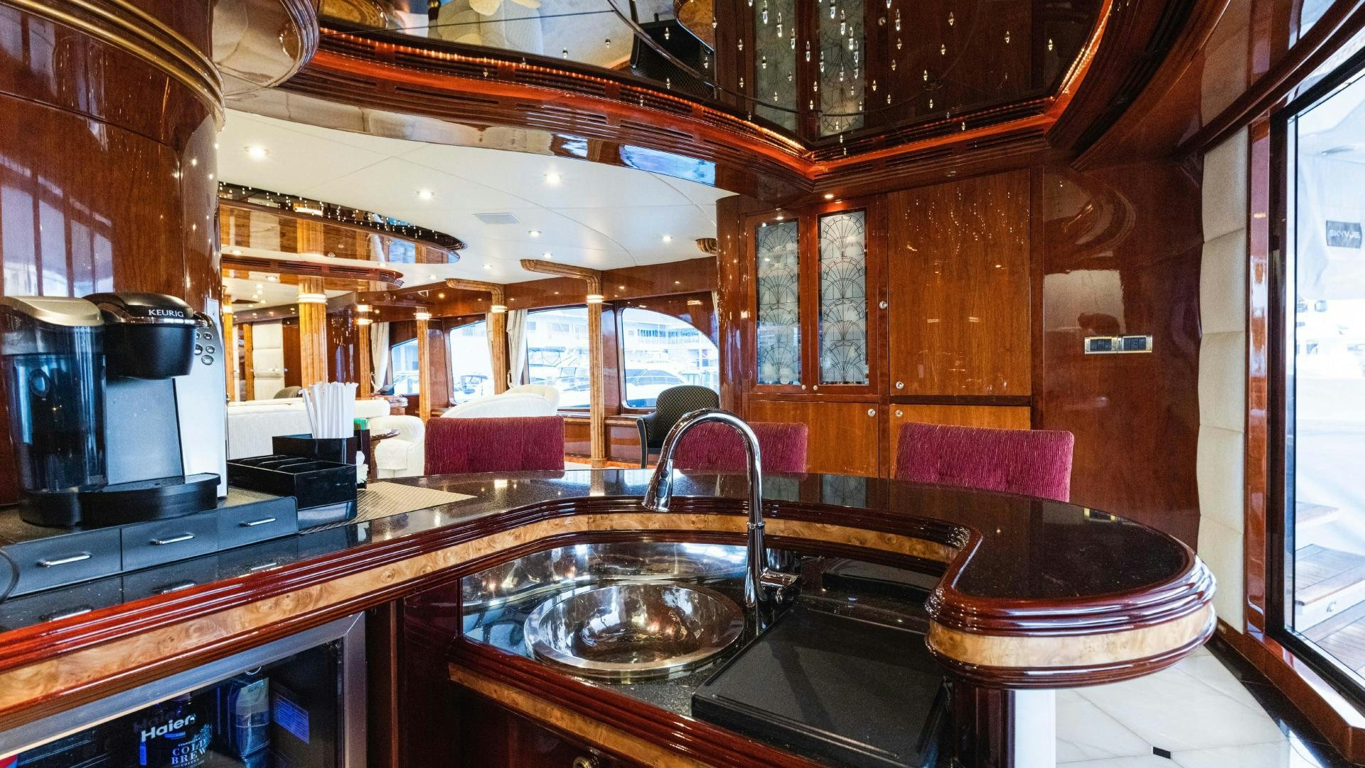 a kitchen with a sink and a stove aboard SEA ALICE I Yacht for Sale