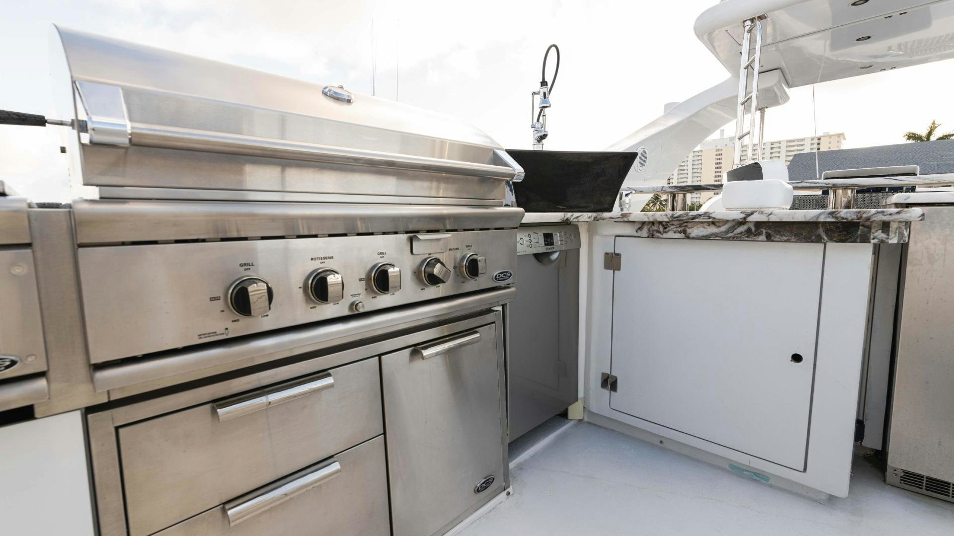a kitchen with stainless steel appliances aboard SEA ALICE I Yacht for Sale