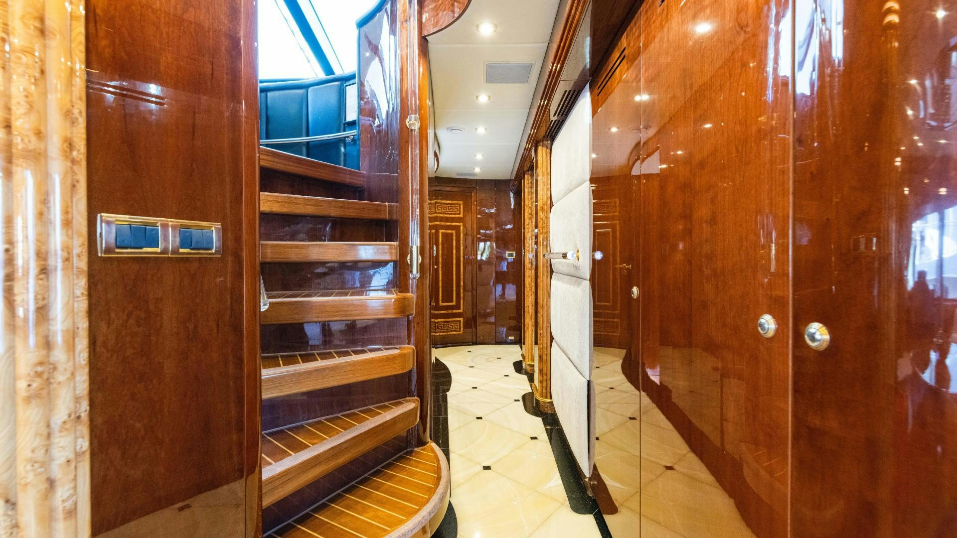 a hallway with wooden doors aboard SEA ALICE I Yacht for Sale