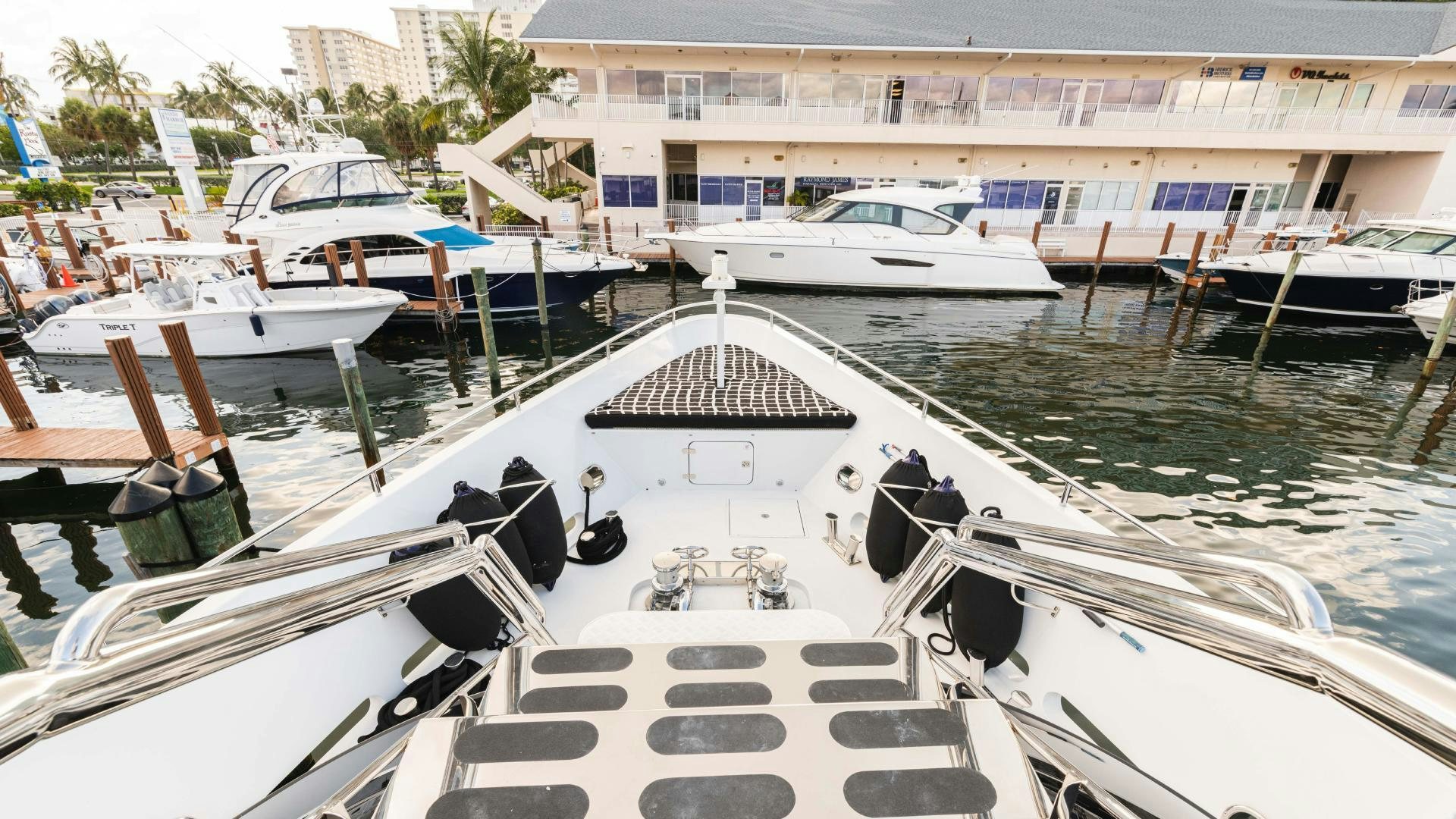 a group of boats are parked in a harbor aboard SEA ALICE I Yacht for Sale