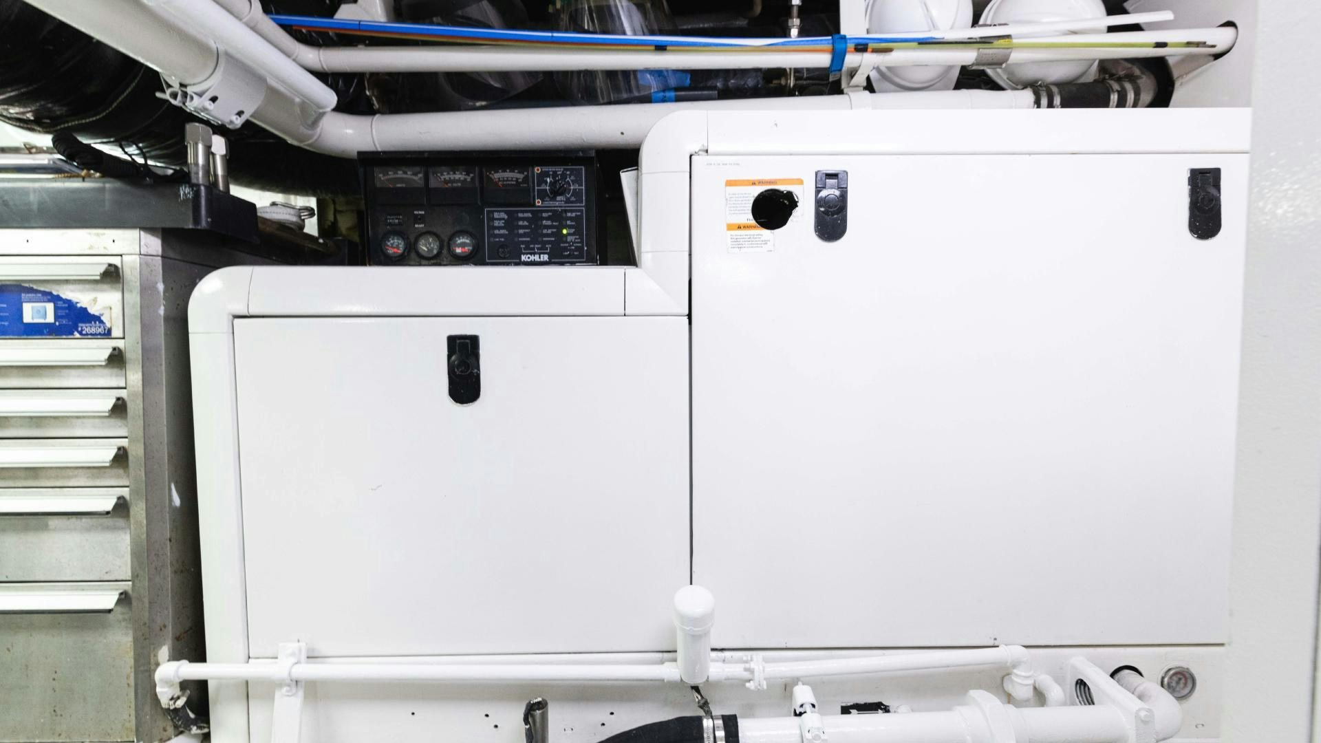 a white machine with buttons aboard SEA ALICE I Yacht for Sale