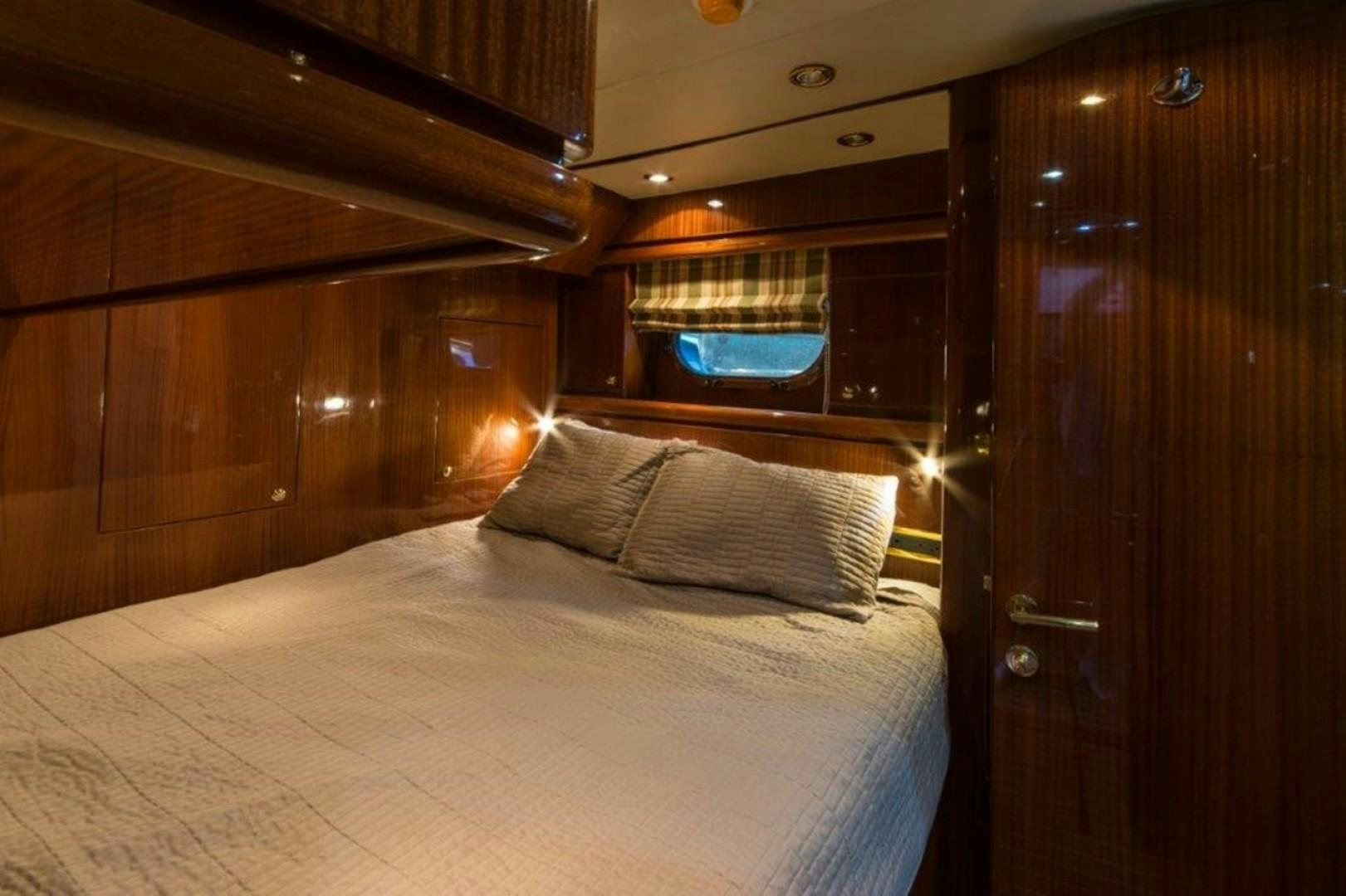 a bed in a cabin aboard MISS DUNIA Yacht for Sale