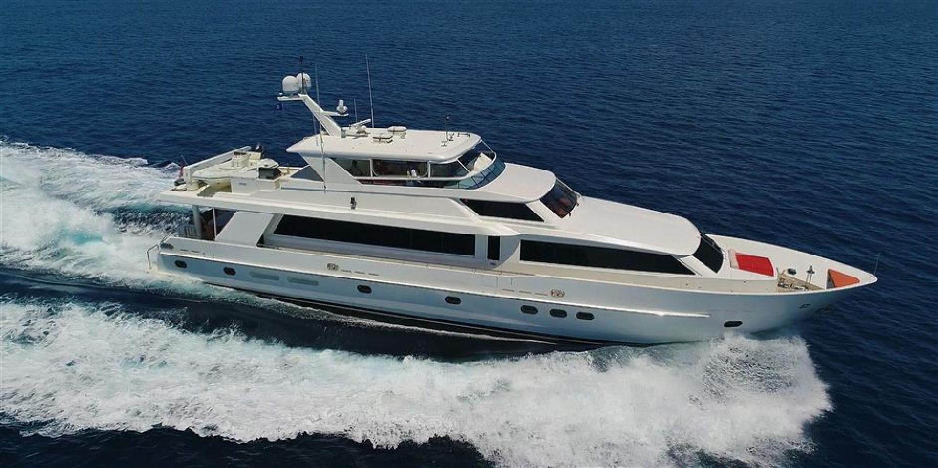 a white yacht on the water aboard MISS DUNIA Yacht for Sale