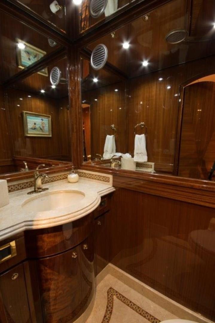 a bathroom with a large mirror aboard MISS DUNIA Yacht for Sale