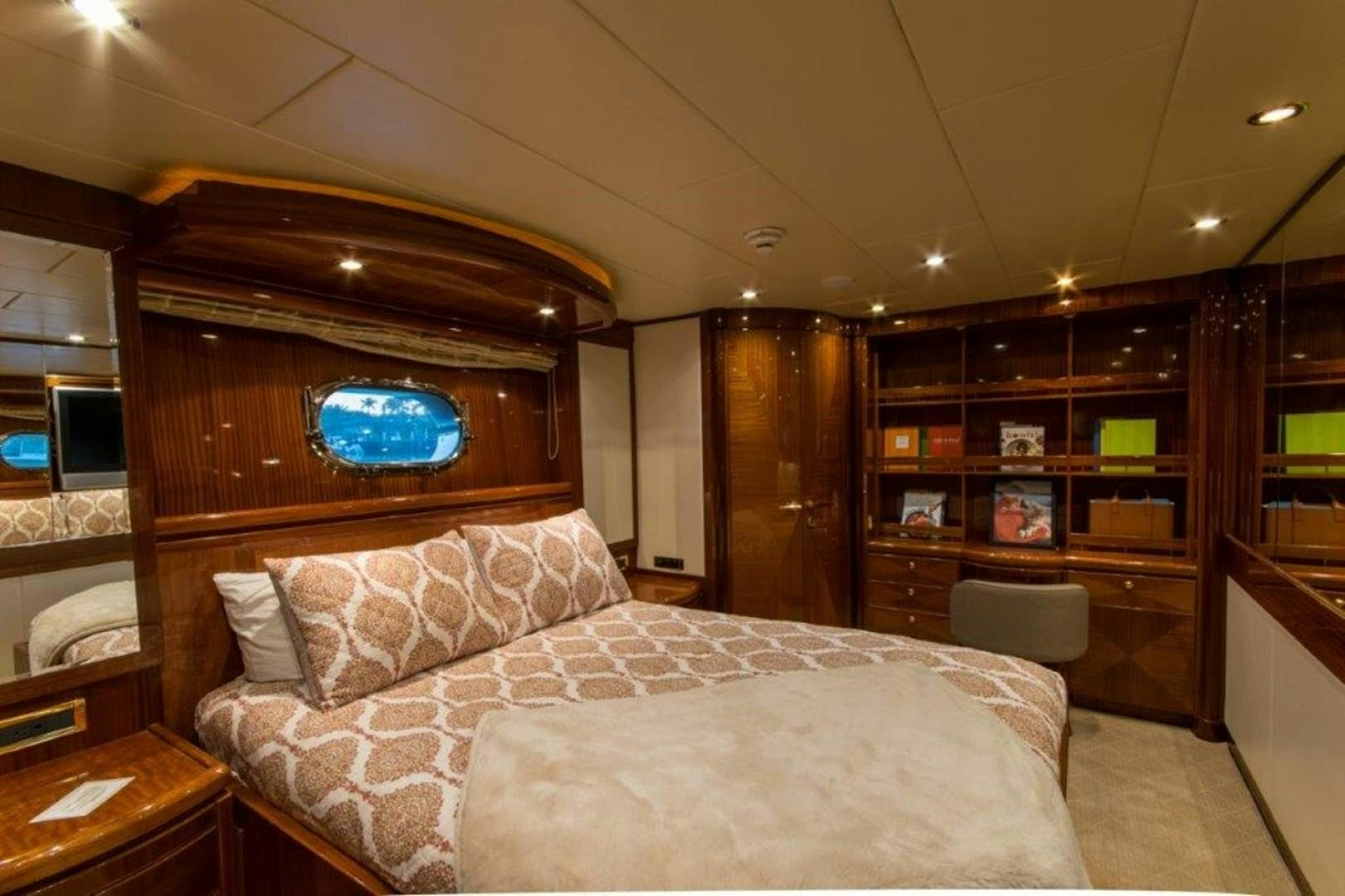 a bed in a room aboard MISS DUNIA Yacht for Sale