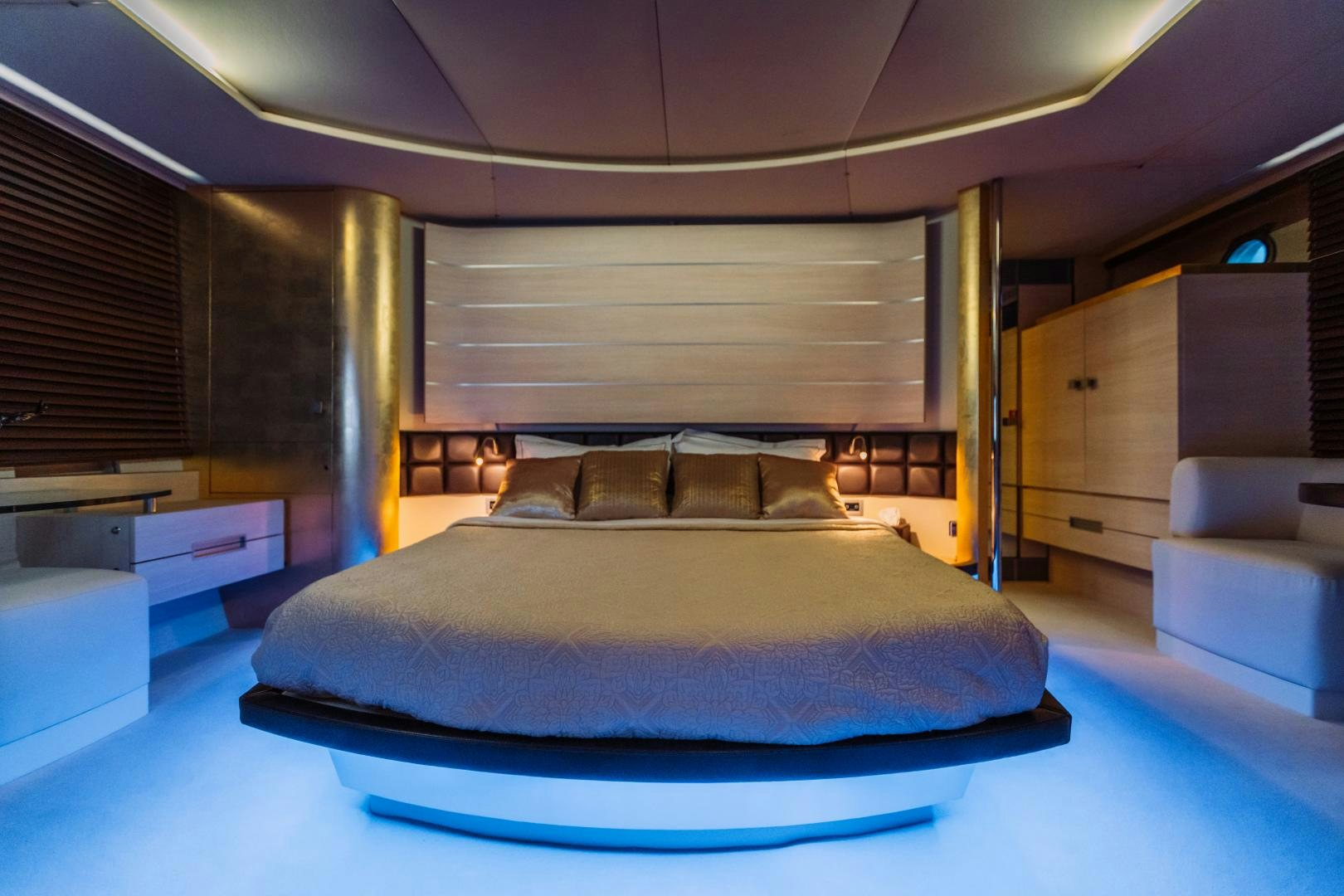 a bed in a room aboard NAMI Yacht for Sale