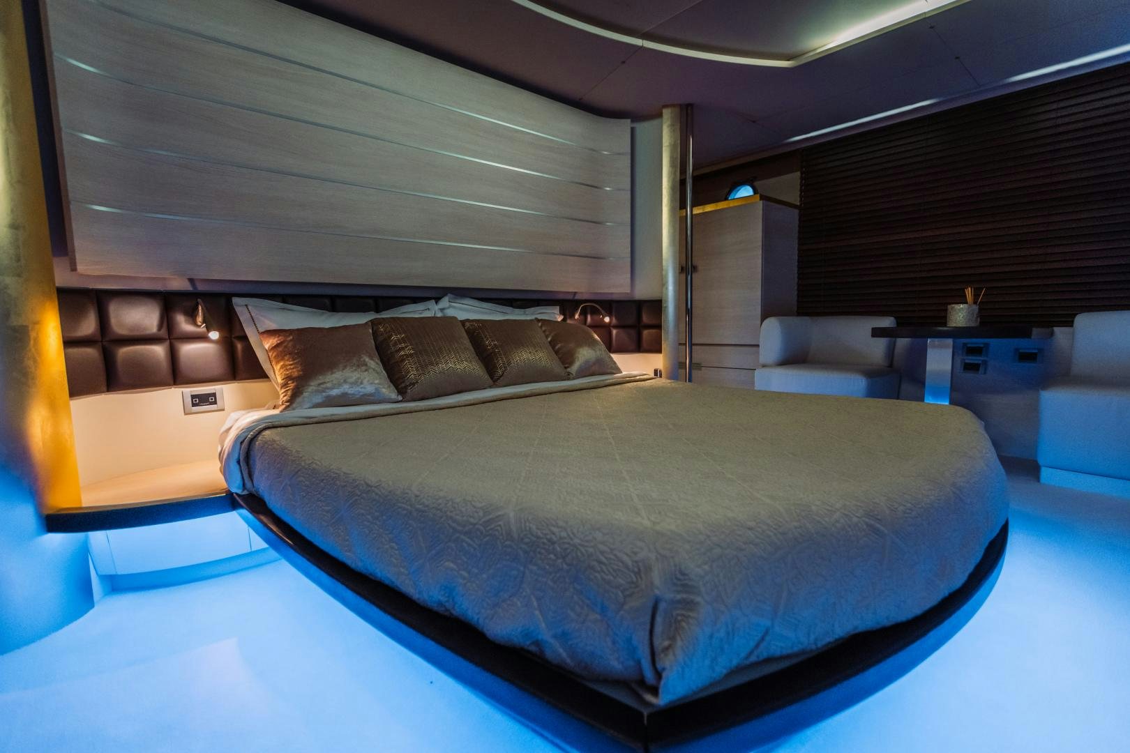 a bed in a room aboard NAMI Yacht for Sale