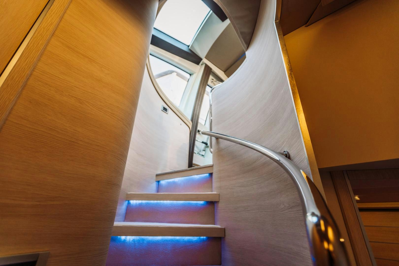 a staircase with a railing aboard NAMI Yacht for Sale