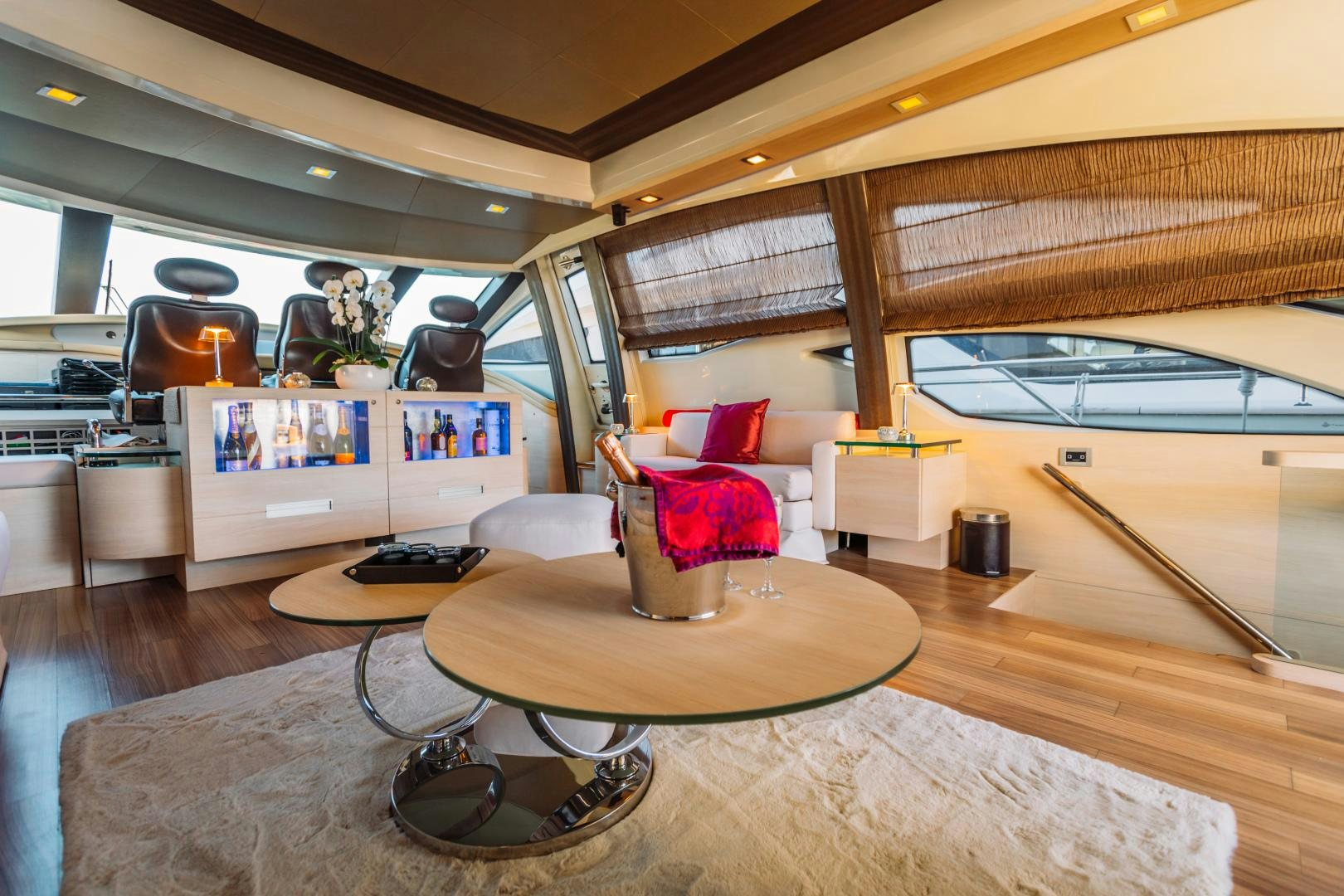a room with a table and chairs aboard NAMI Yacht for Sale