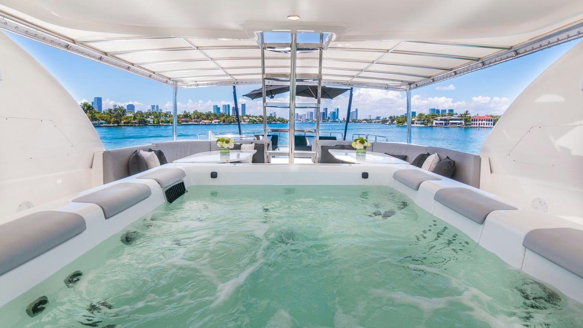 a pool with a large deck aboard NIRVANA Yacht for Sale