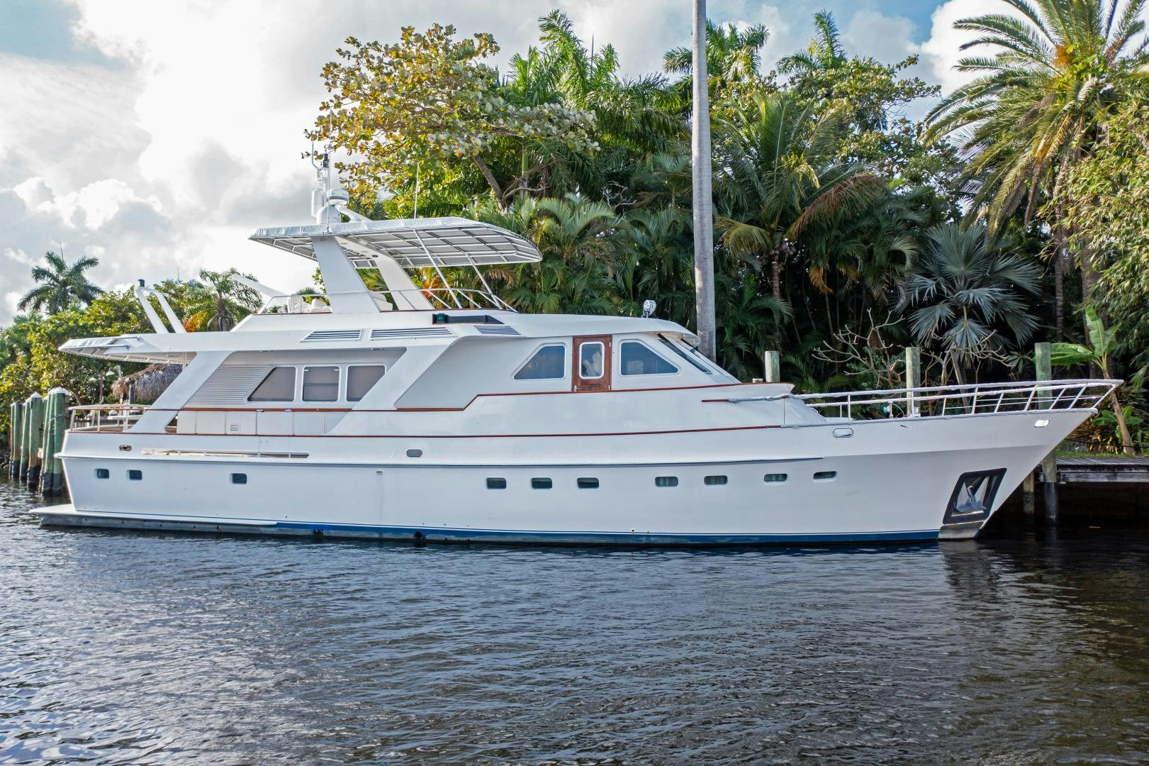 a large white boat in the water aboard SEAEO Yacht for Sale