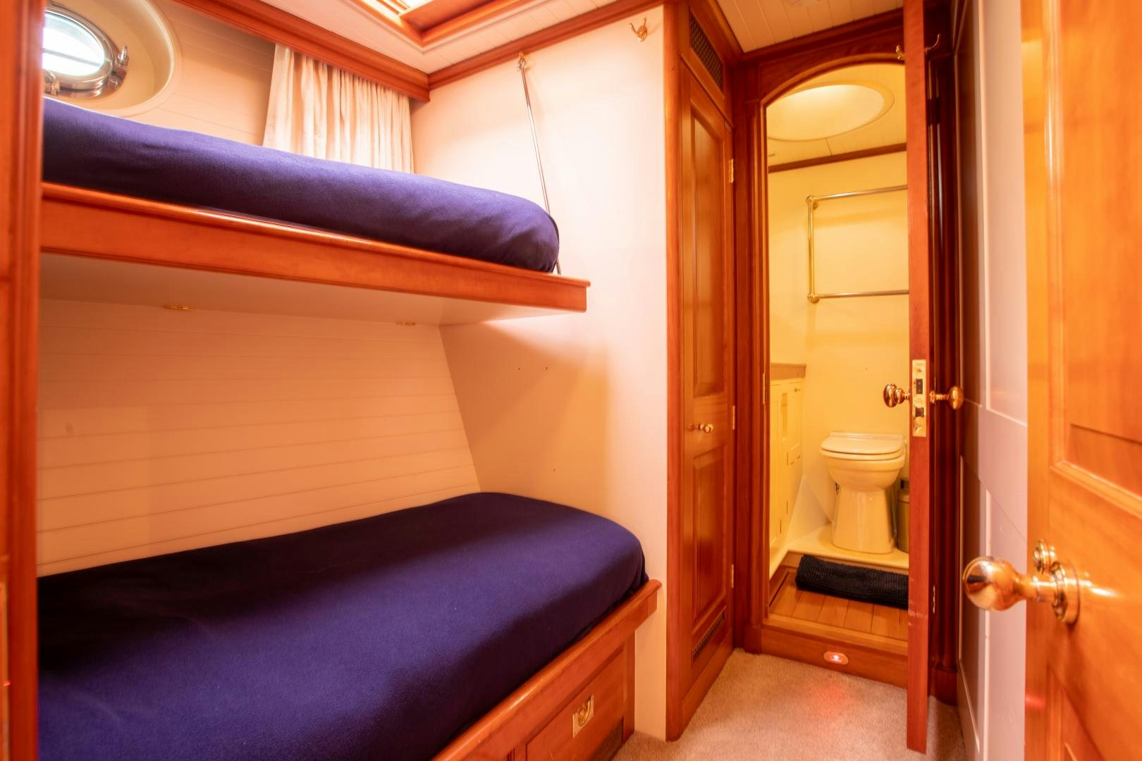 a bed in a room aboard AUDREY II Yacht for Sale