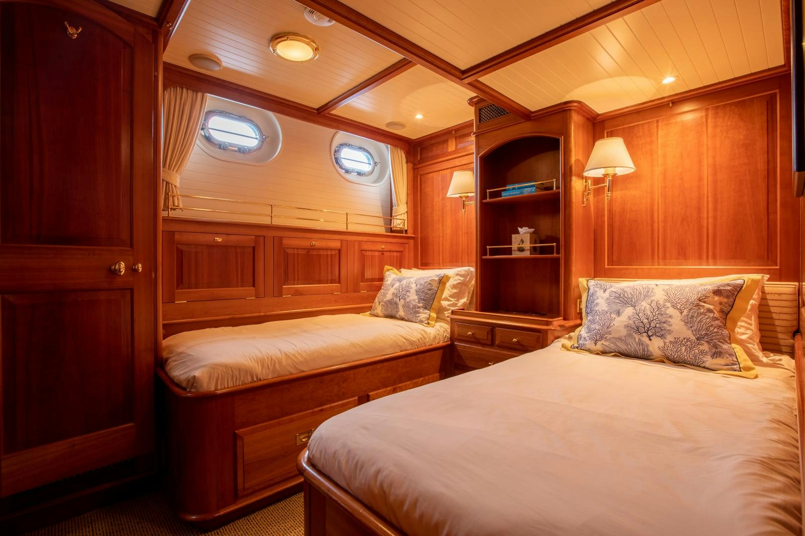 a room with two beds aboard AUDREY II Yacht for Sale