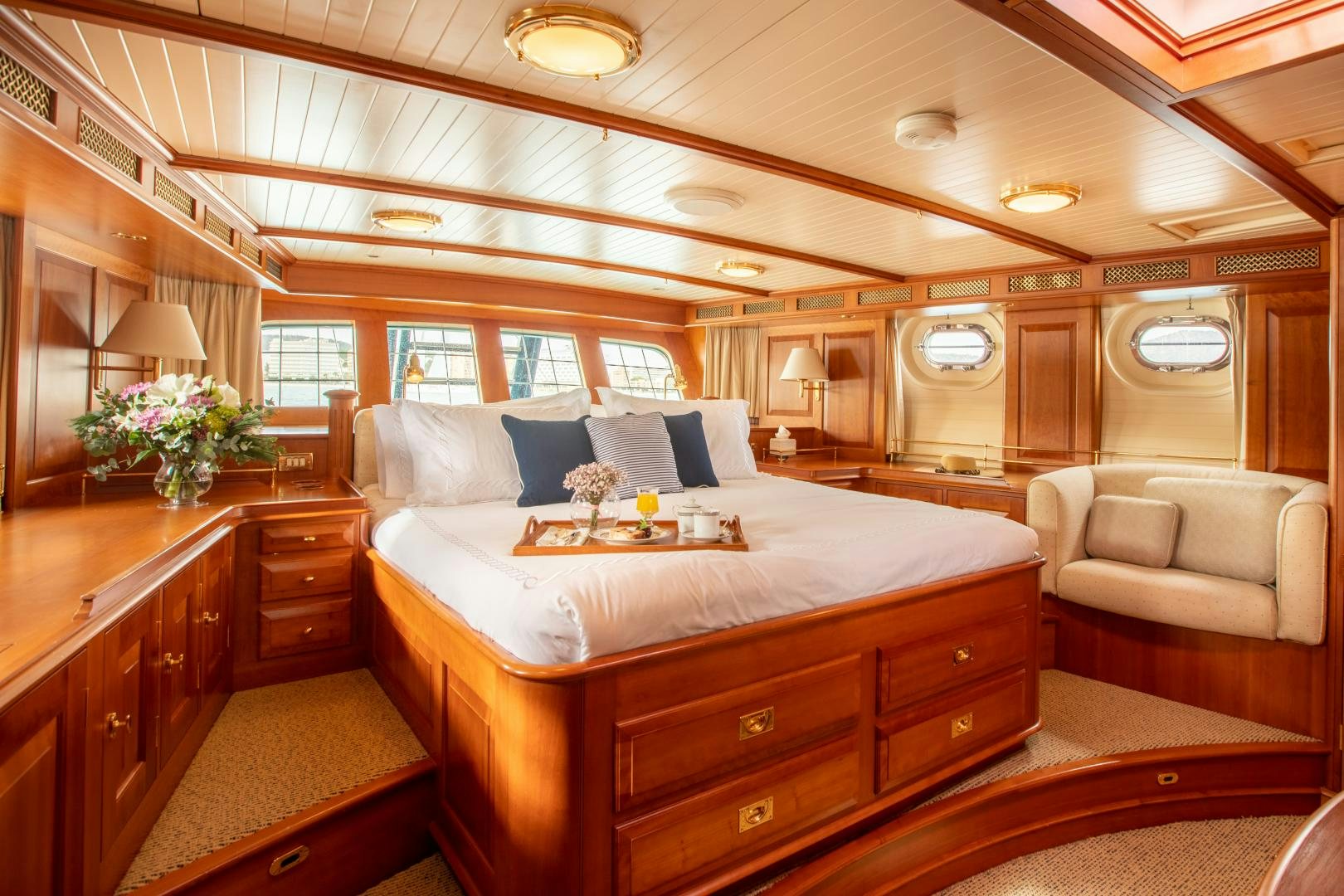 a large bedroom with a bed aboard AUDREY II Yacht for Sale