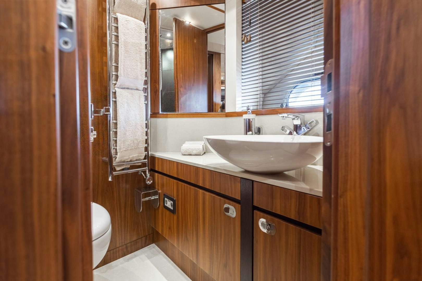 a bathroom with a sink and a toilet aboard FREAKY FRANKS Yacht for Sale