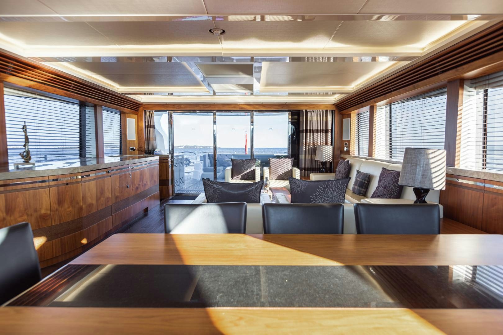 a room with a table and chairs aboard FREAKY FRANKS Yacht for Sale