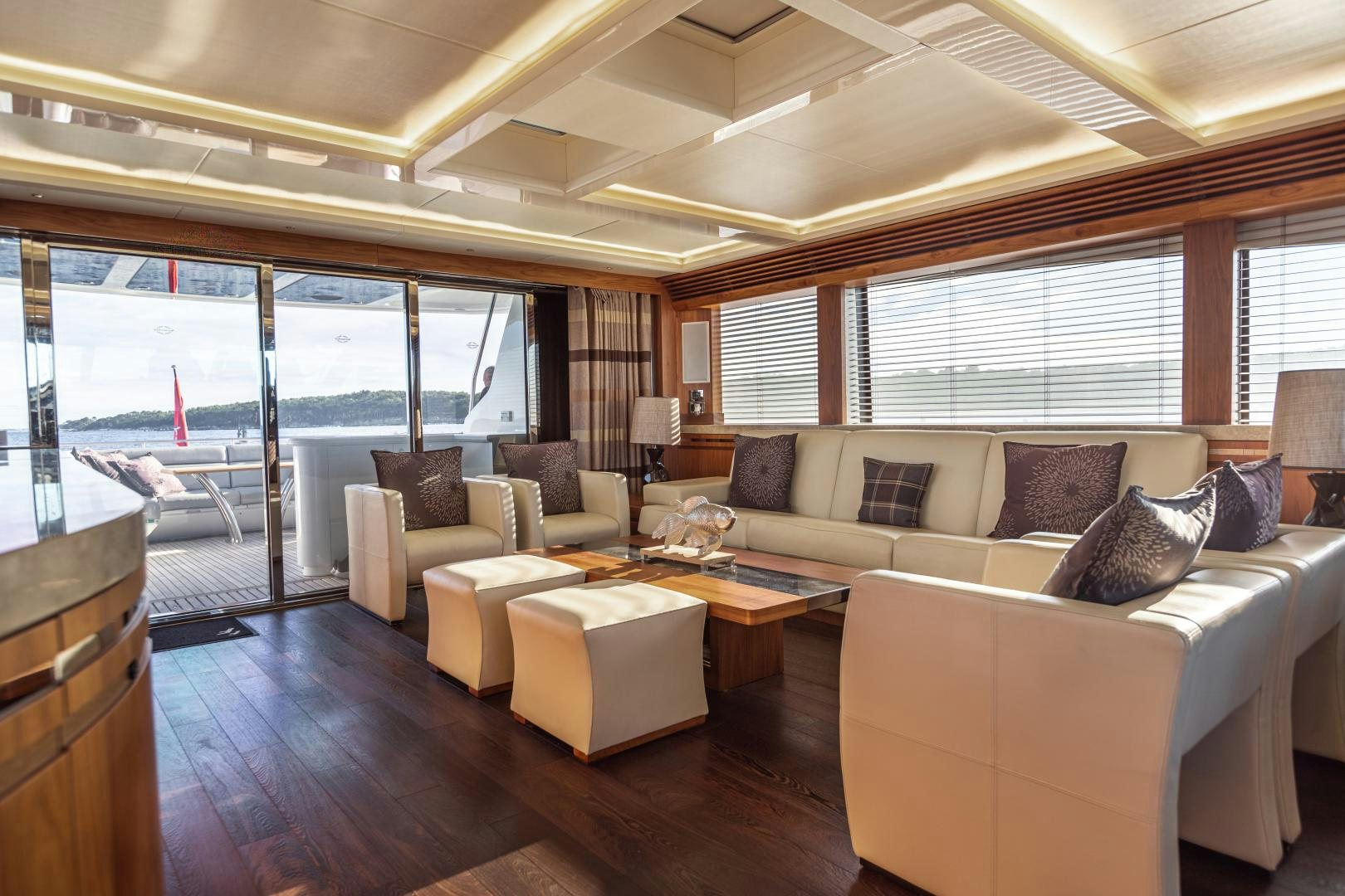 a living room with a large window aboard FREAKY FRANKS Yacht for Sale