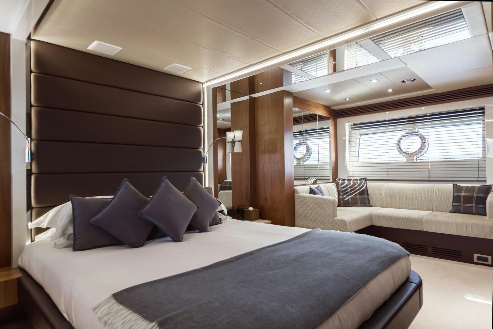 a room with a bed and a couch aboard FREAKY FRANKS Yacht for Sale