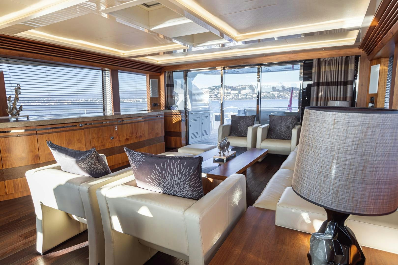 a room with a table chairs and a window aboard FREAKY FRANKS Yacht for Sale