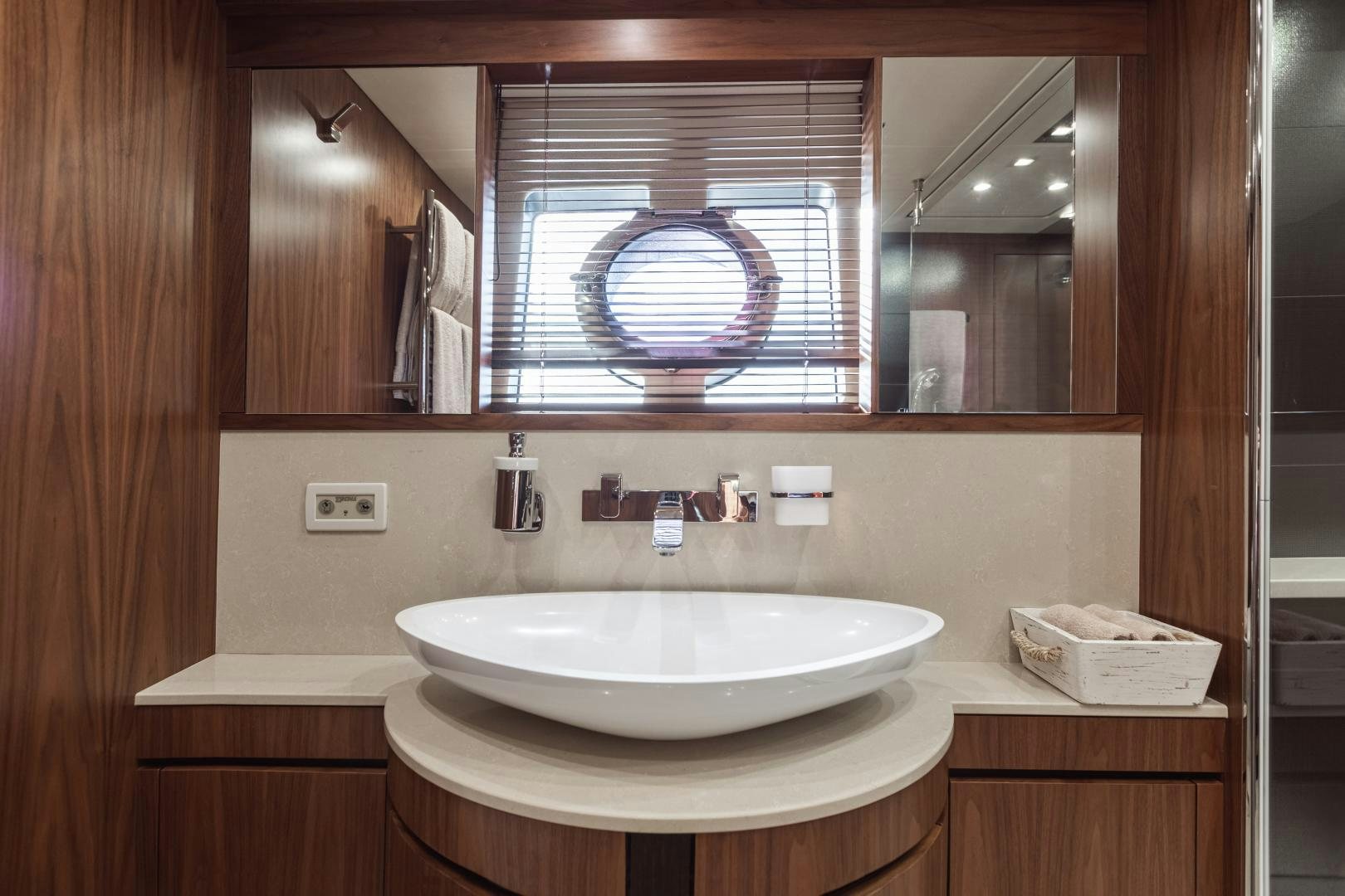a bathroom with a sink and a mirror aboard FREAKY FRANKS Yacht for Sale