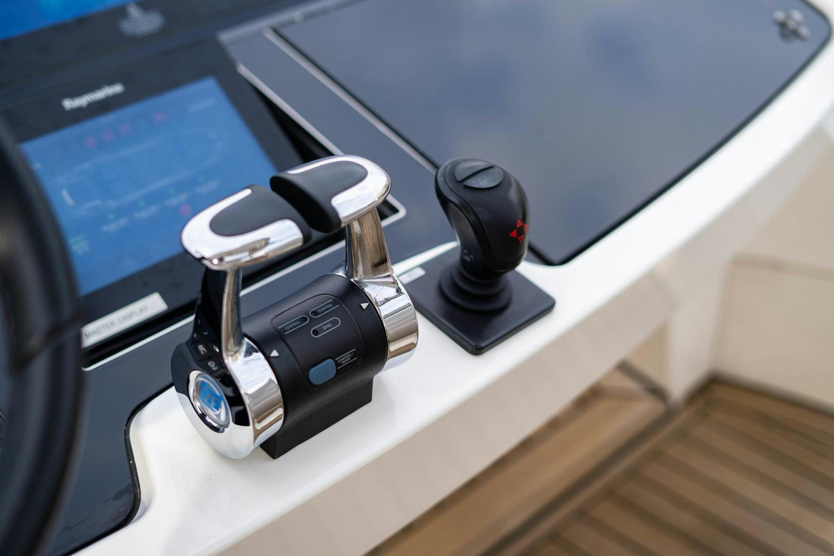 a gaming console and controller aboard BLIND DATE Yacht for Sale