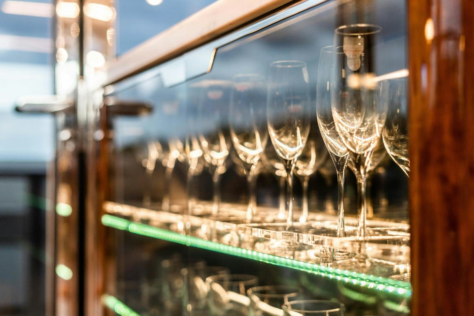 a group of wine glasses aboard BLIND DATE Yacht for Sale