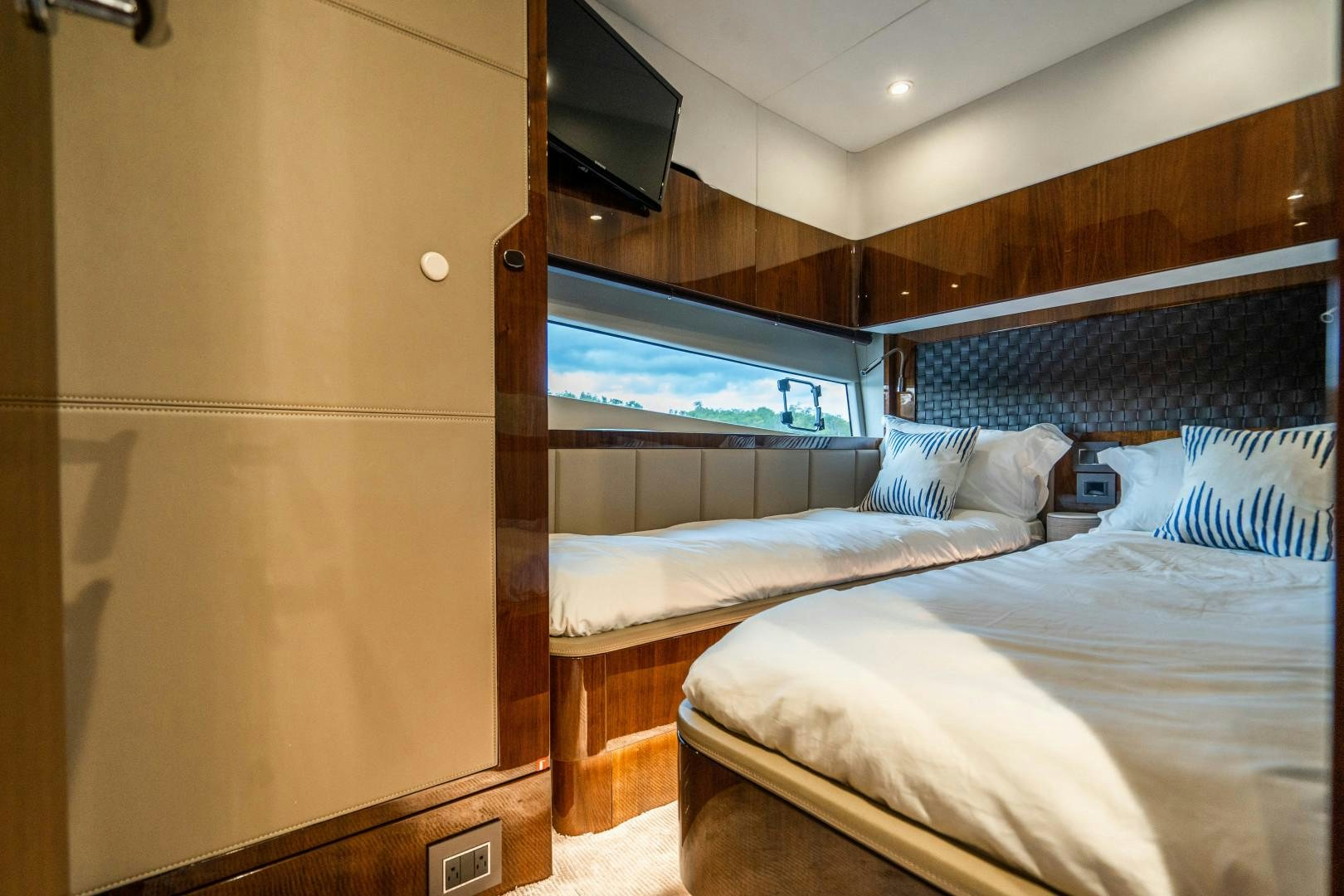 a room with two beds aboard BLIND DATE Yacht for Sale