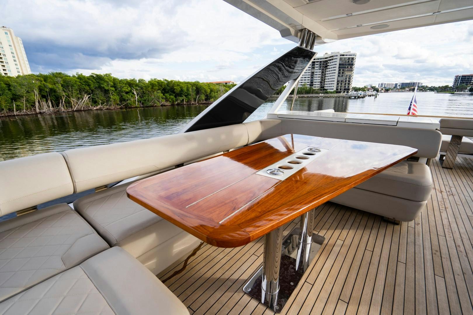a wooden table on a boat aboard BLIND DATE Yacht for Sale