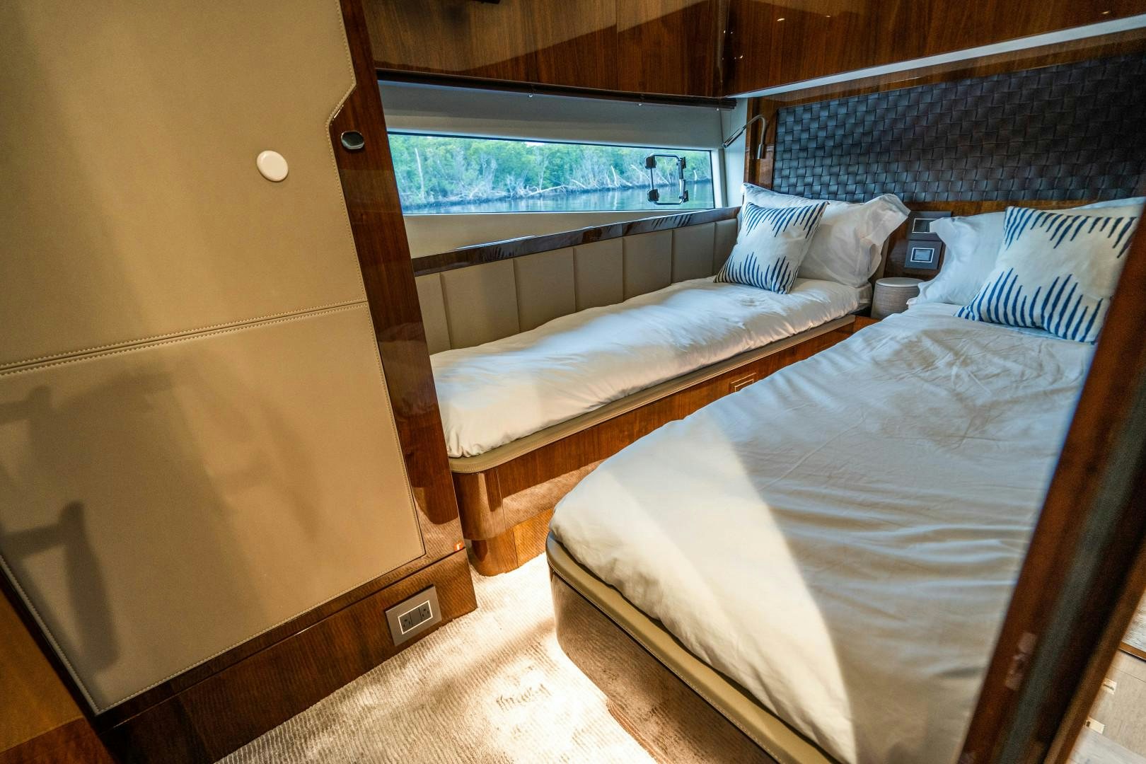 a couple of beds in a room aboard BLIND DATE Yacht for Sale