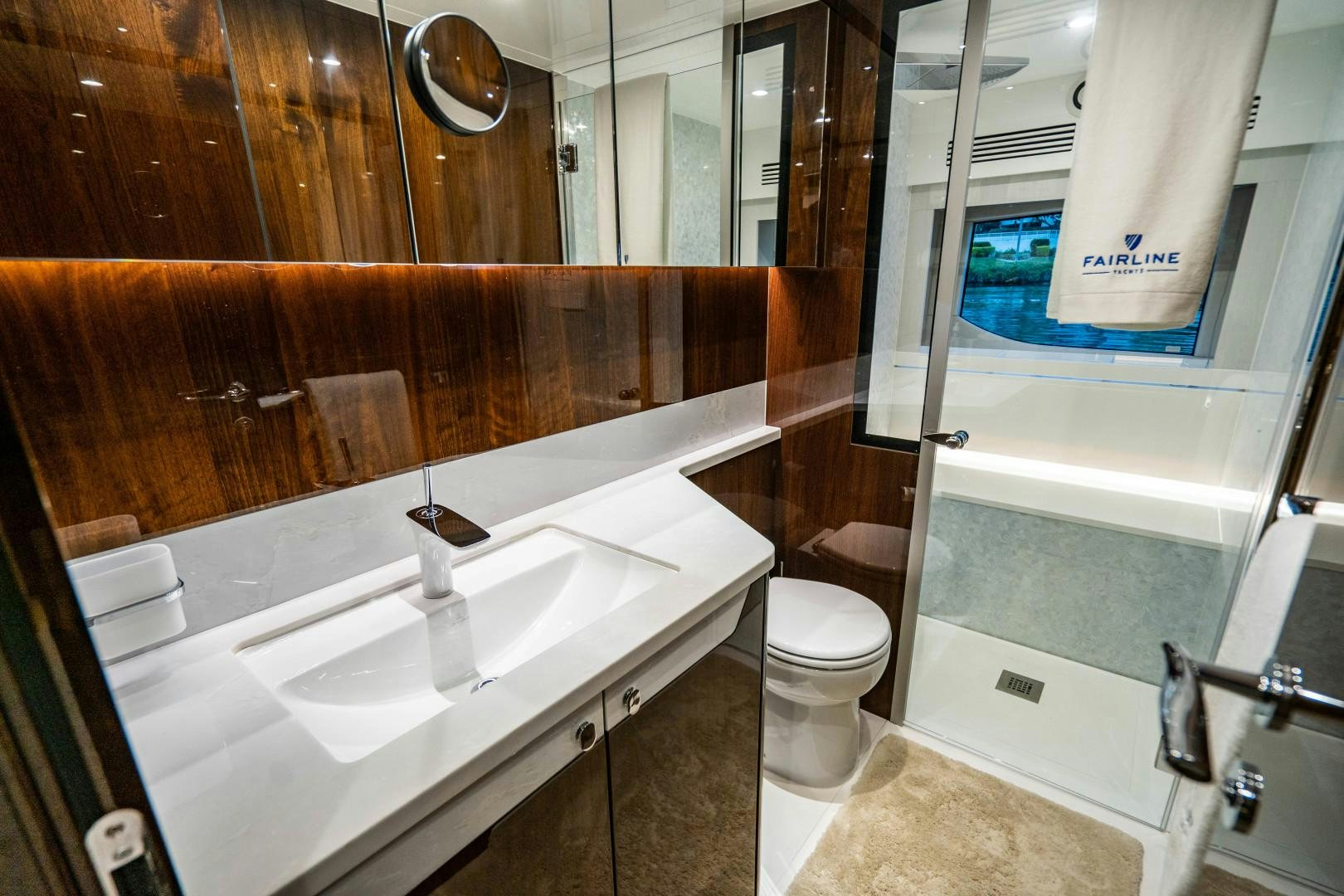 a bathroom with a sink toilet and bathtub aboard BLIND DATE Yacht for Sale