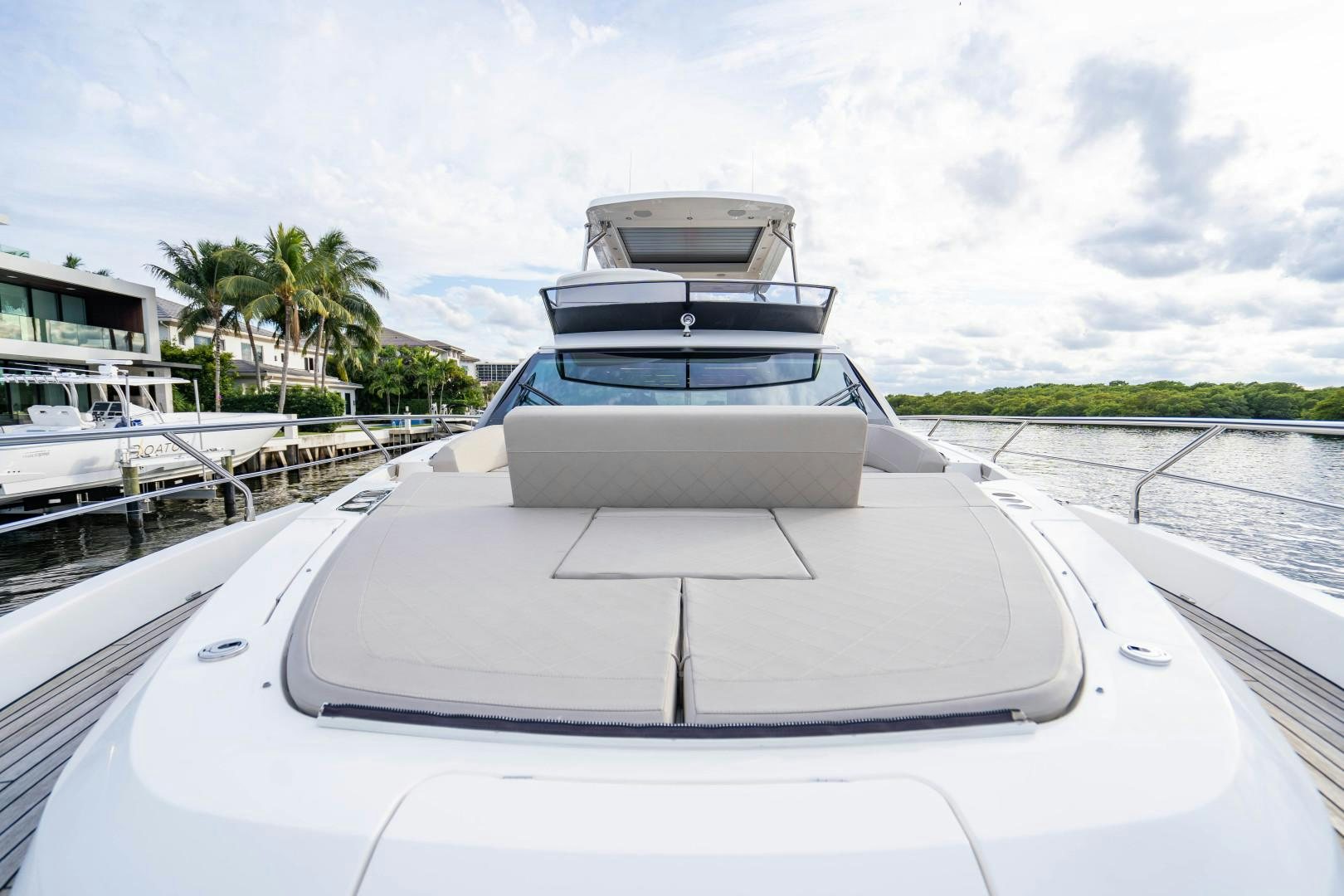 a white car on a road aboard BLIND DATE Yacht for Sale