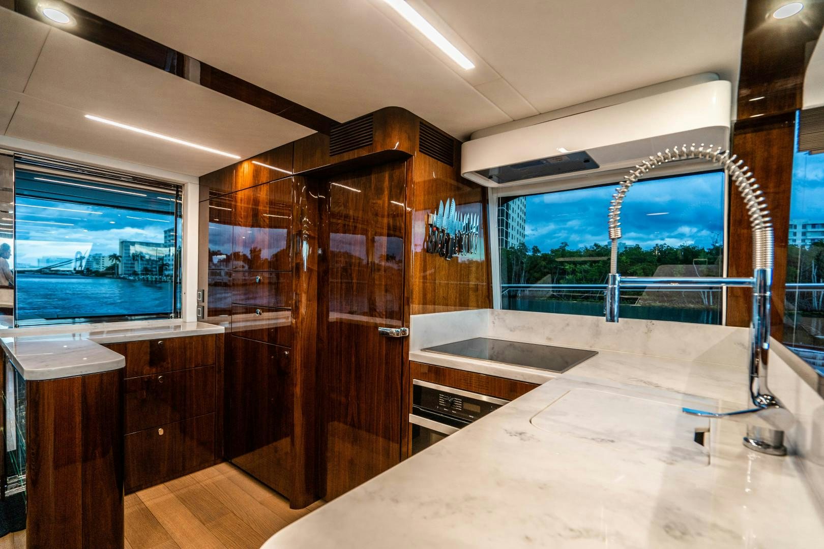 a room with a table and tv aboard BLIND DATE Yacht for Sale