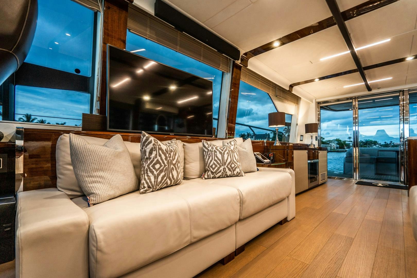 a living room with a large window aboard BLIND DATE Yacht for Sale