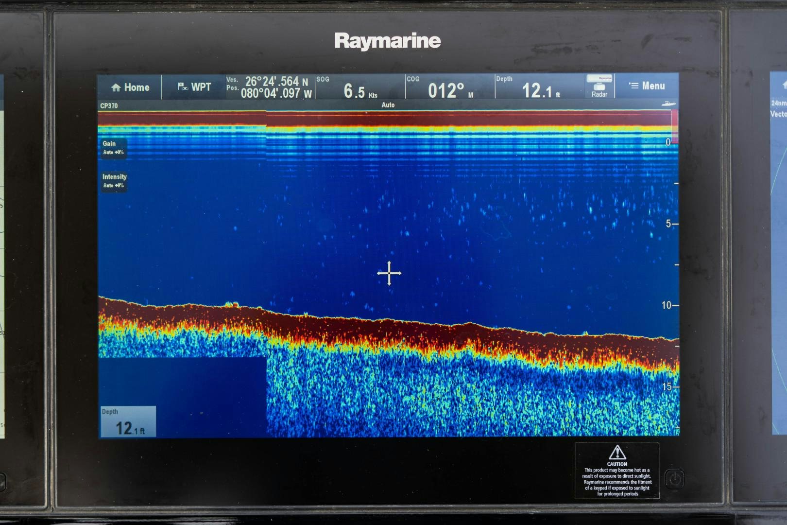 a computer screen with a blue and red background aboard BLIND DATE Yacht for Sale