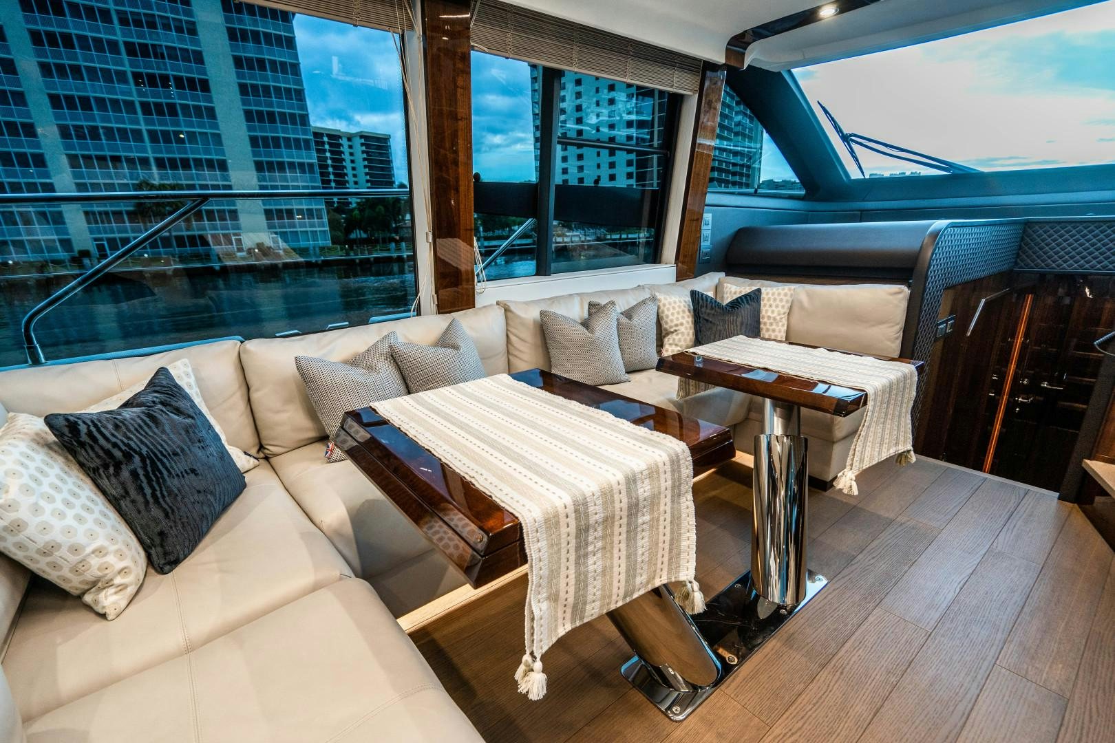 a living room with a couch and a table aboard BLIND DATE Yacht for Sale