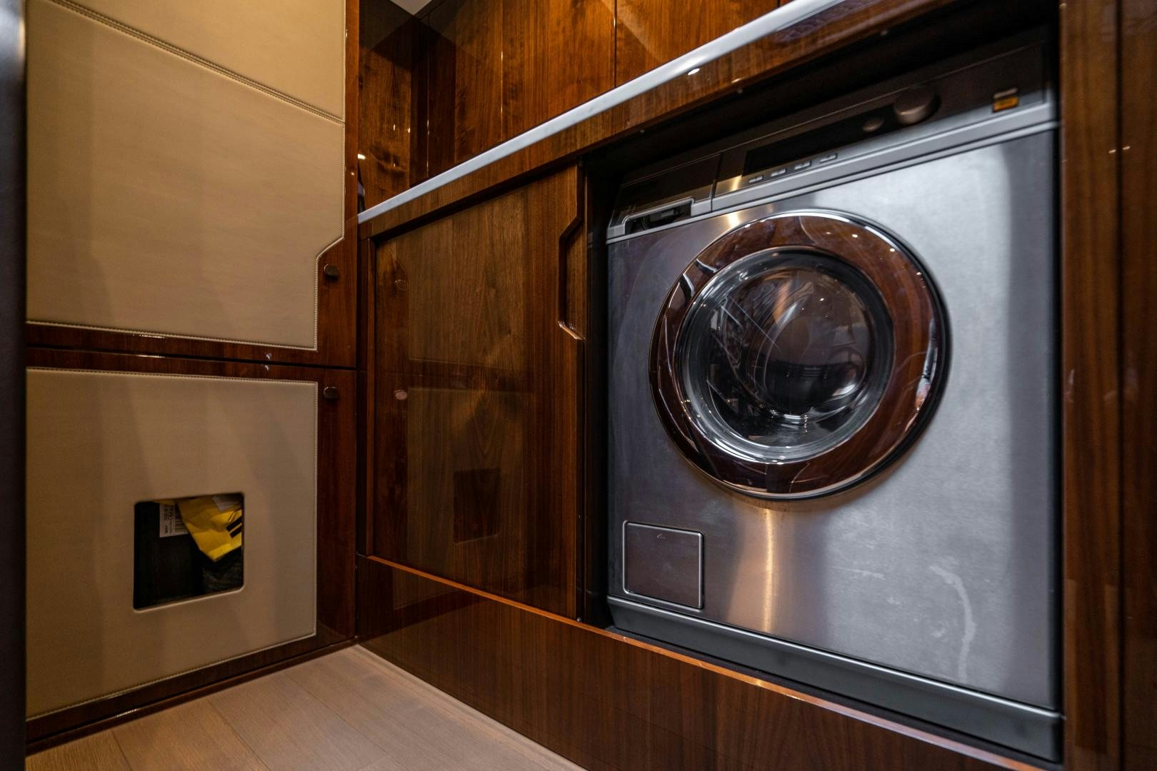 a large speaker in a wooden cabinet aboard BLIND DATE Yacht for Sale