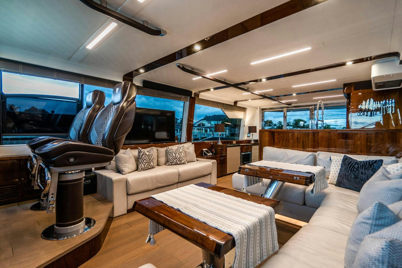 a living room with a couch and a coffee table aboard BLIND DATE Yacht for Sale