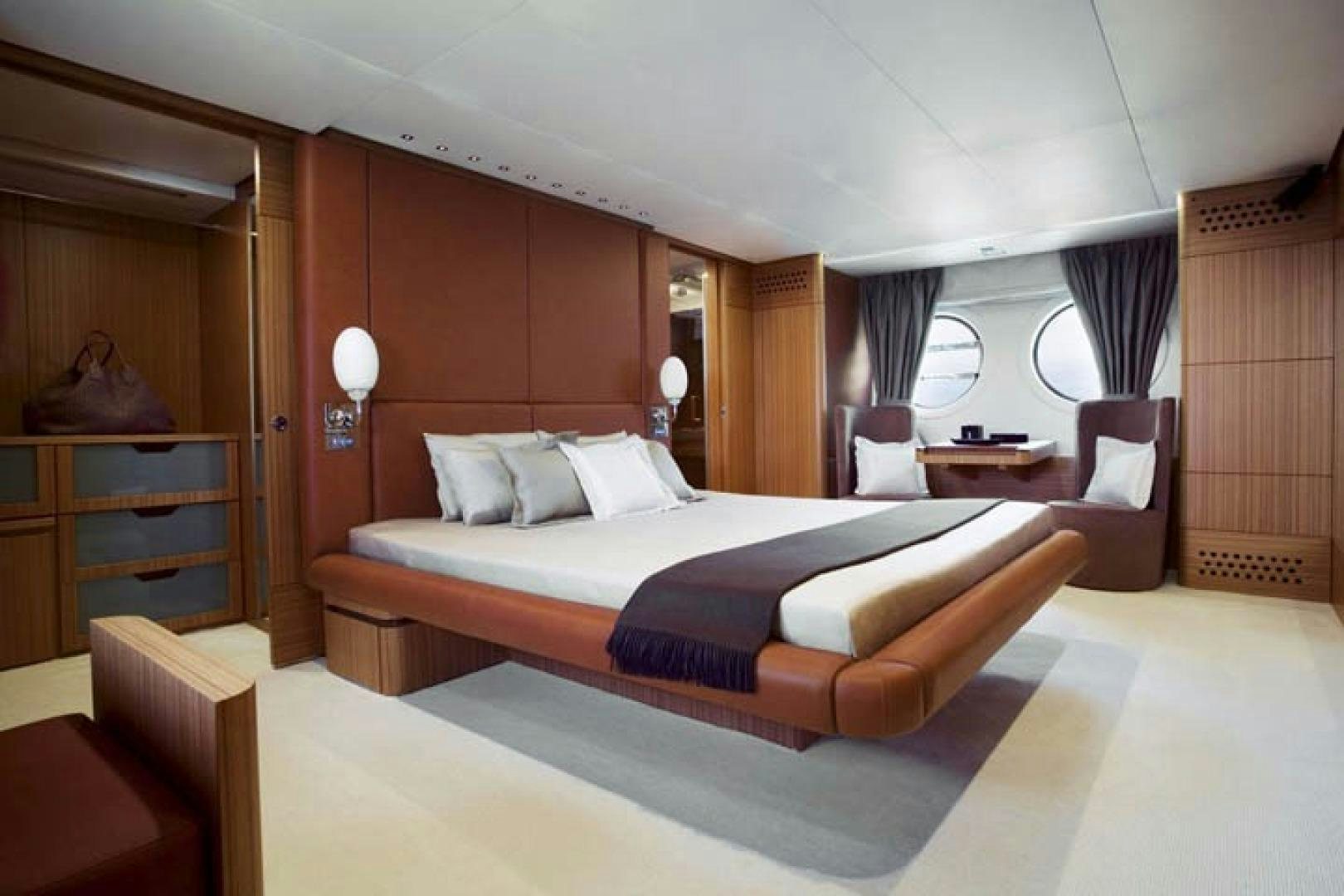 a bed in a room aboard BLUWATER Yacht for Sale