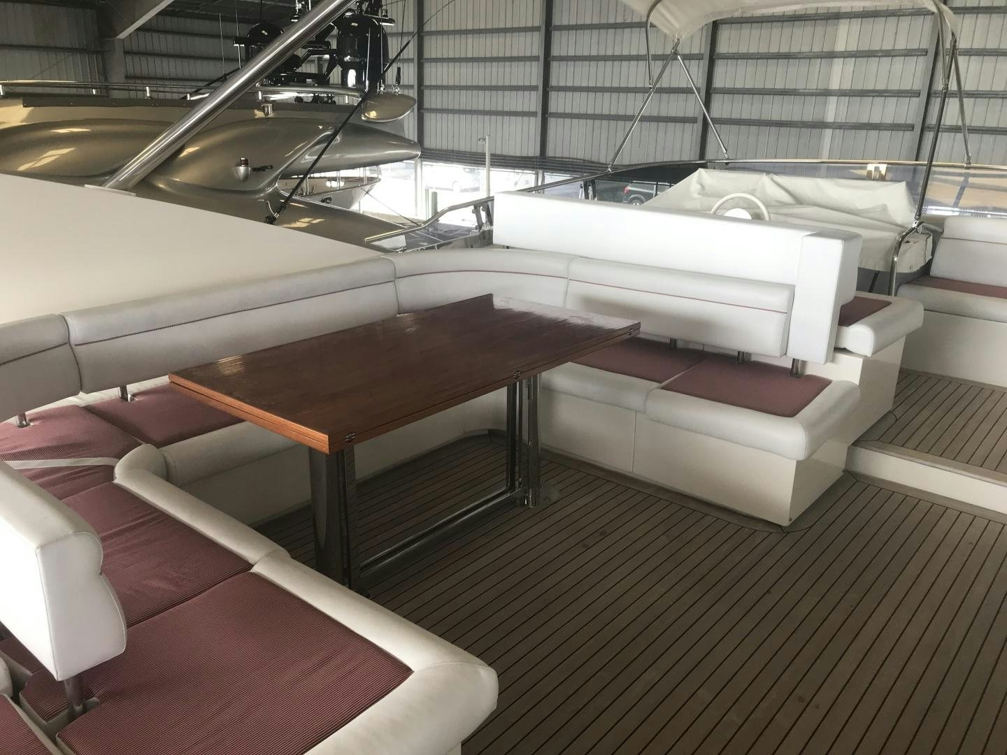 a room with couches and a table aboard BLUWATER Yacht for Sale