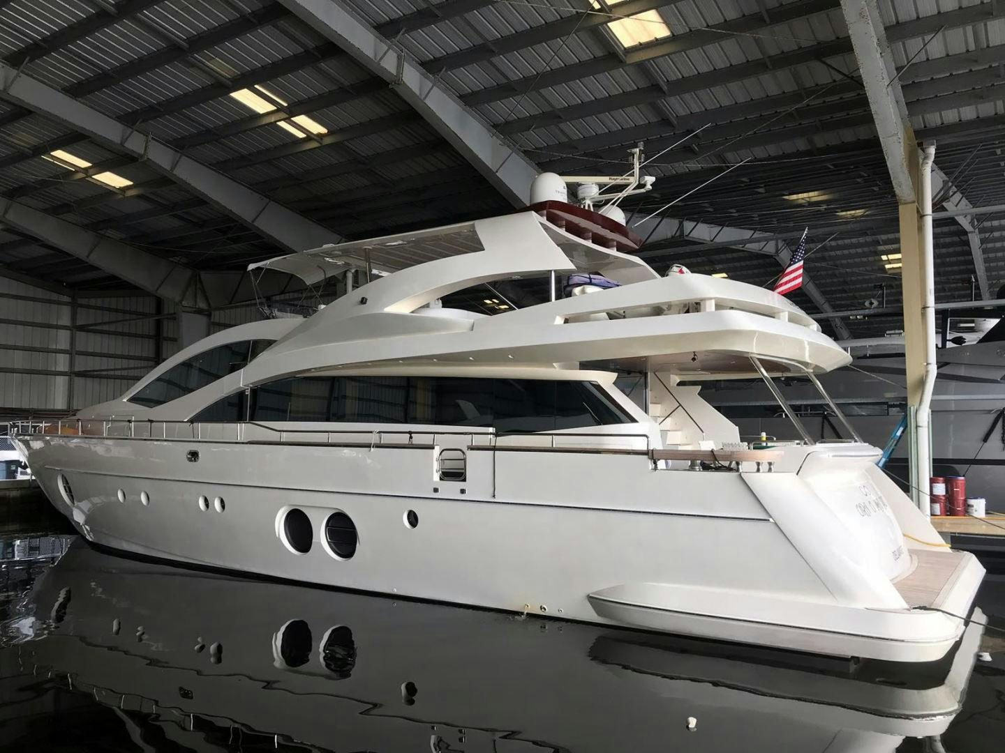 a white yacht in a building aboard BLUWATER Yacht for Sale