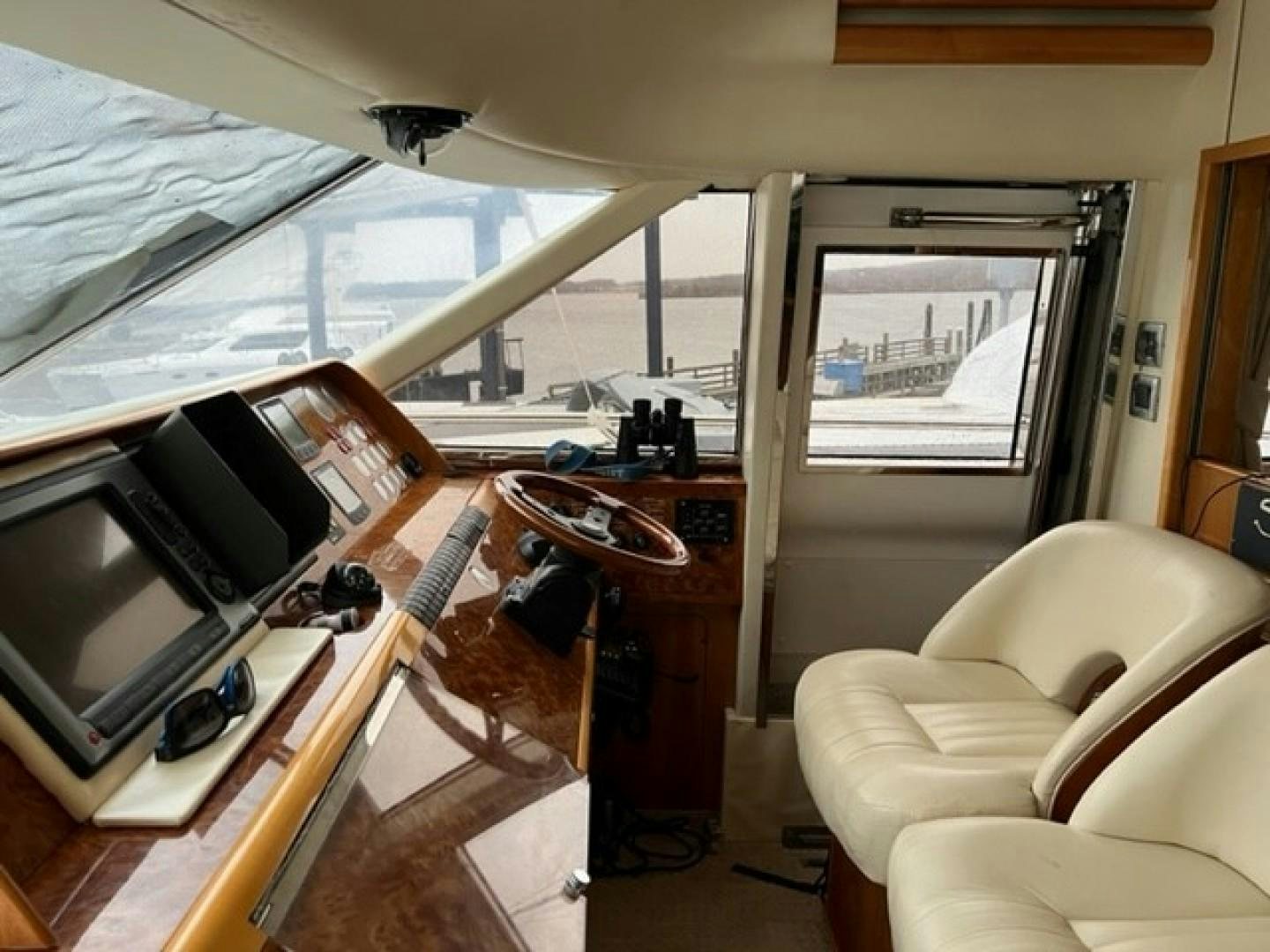 a room with a bed and a desk aboard JOIE DU ROI Yacht for Sale