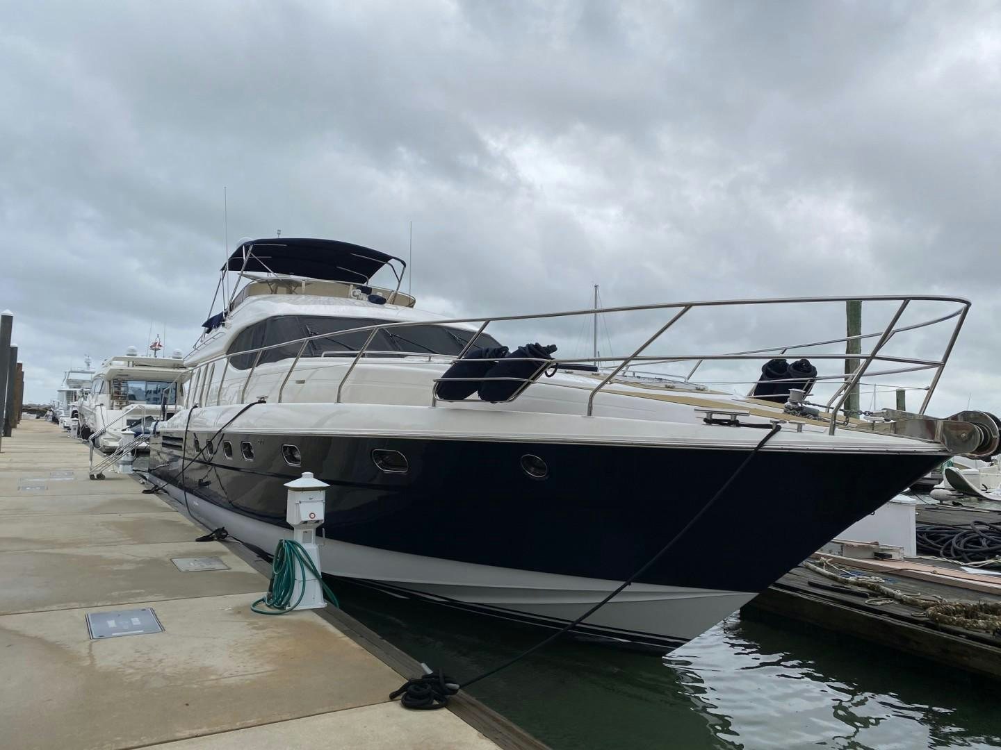 a boat docked at a pier aboard JOIE DU ROI Yacht for Sale