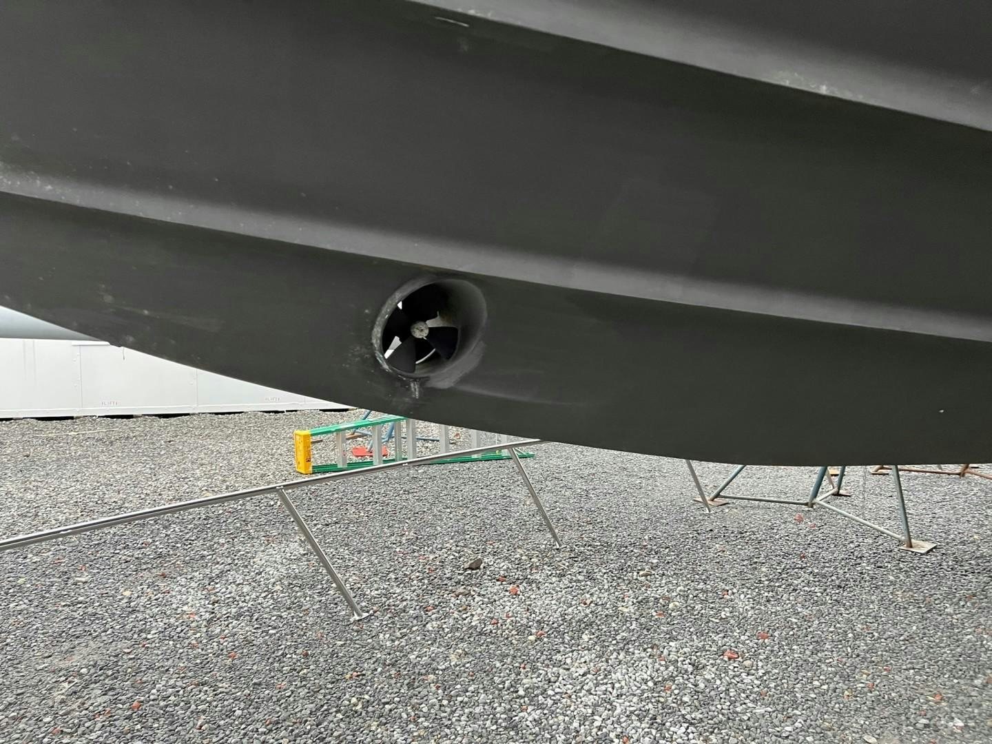 a green and yellow object under a car aboard JOIE DU ROI Yacht for Sale