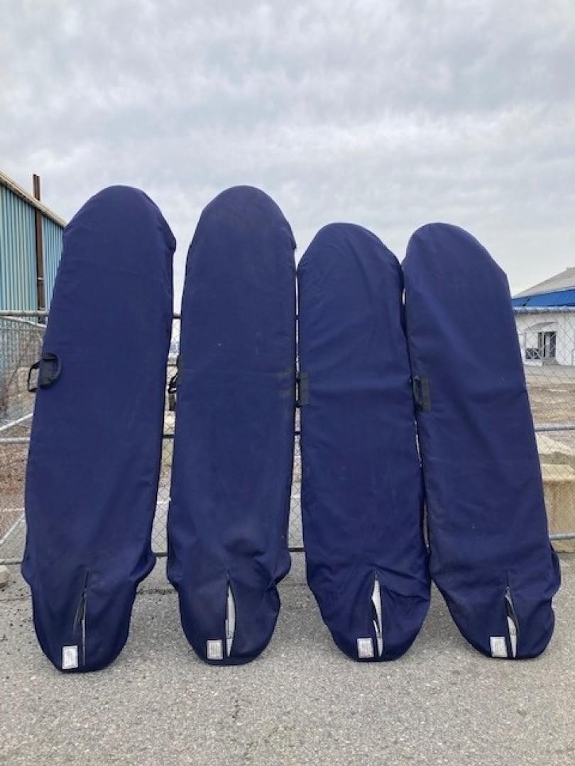 a group of black surfboards aboard JOIE DU ROI Yacht for Sale