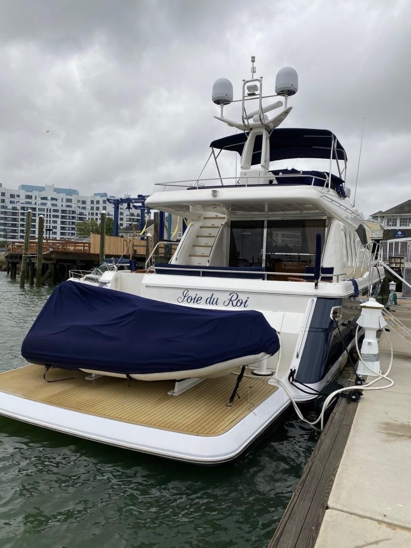 a boat docked at a pier aboard JOIE DU ROI Yacht for Sale